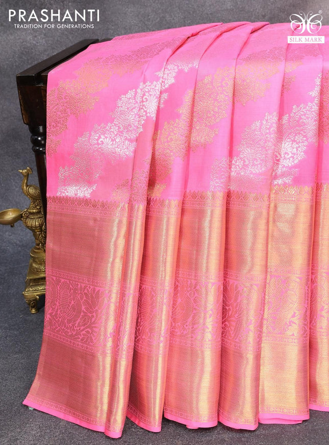 Pure kanjivaram silk saree candy pink with allover silver & gold zari woven floral weaves and long rich annam & parrot zari woven border