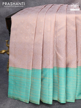 Pure kanjivaram silk saree grey and teal green shade with allover zari woven brocade weaves and zari woven border