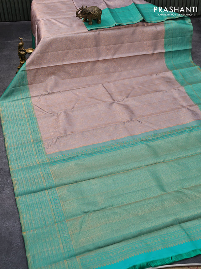 Pure kanjivaram silk saree grey and teal green shade with allover zari woven brocade weaves and zari woven border