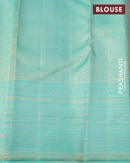 Pure kanjivaram silk saree grey and teal green shade with allover zari woven brocade weaves and zari woven border
