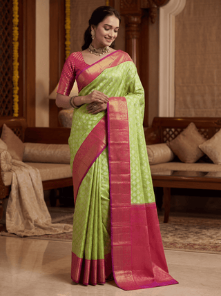 Pure kanjivaram silk saree pista green and dual shade of pinkish orange with allover silver & gold zari woven brocade weaves and floral zari woven korvai border