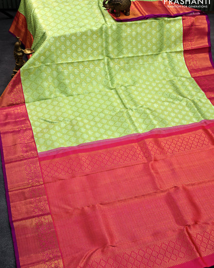 Pure kanjivaram silk saree pista green and dual shade of pinkish orange with allover silver & gold zari woven brocade weaves and floral zari woven korvai border