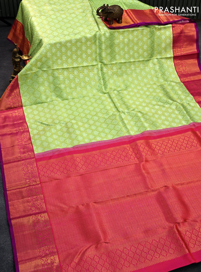 Pure kanjivaram silk saree pista green and dual shade of pinkish orange with allover silver & gold zari woven brocade weaves and floral zari woven korvai border