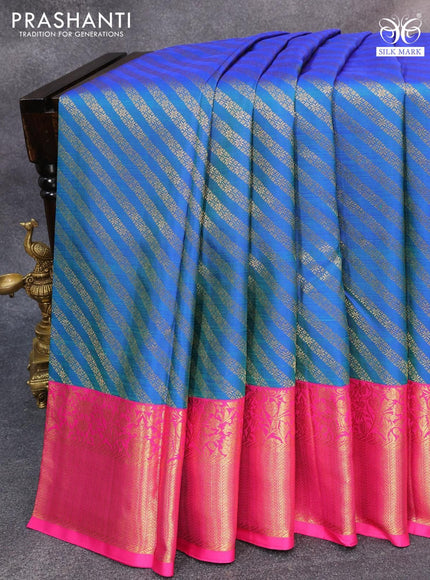 Pure kanjivaram silk saree dual shade of bluish green and pink with allover zari weaves and rich floral zari woven border