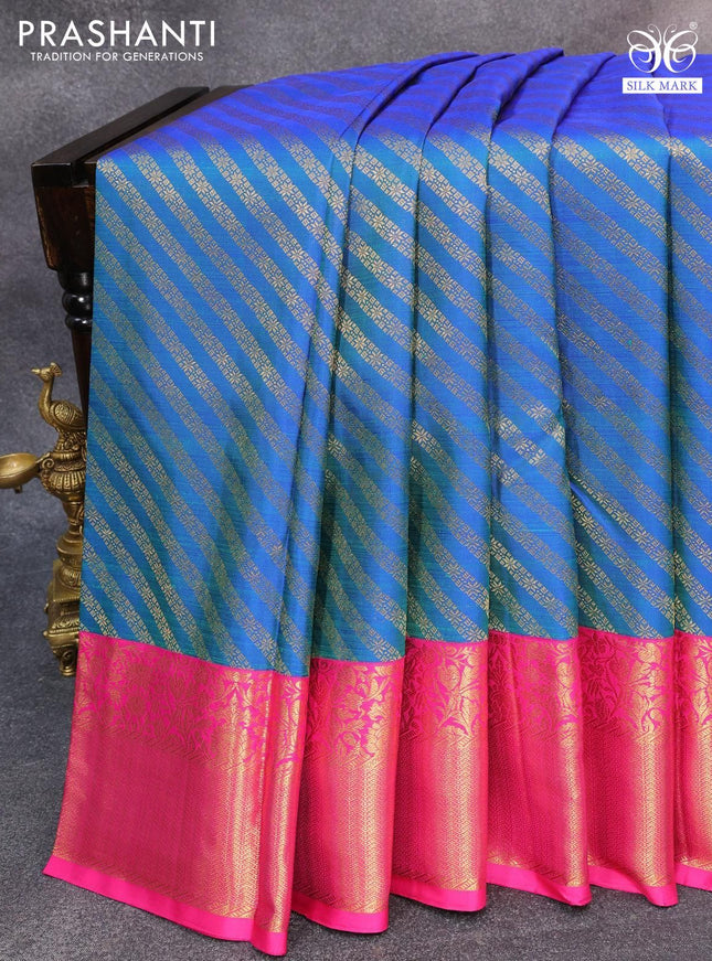 Pure kanjivaram silk saree dual shade of bluish green and pink with allover zari weaves and rich floral zari woven border