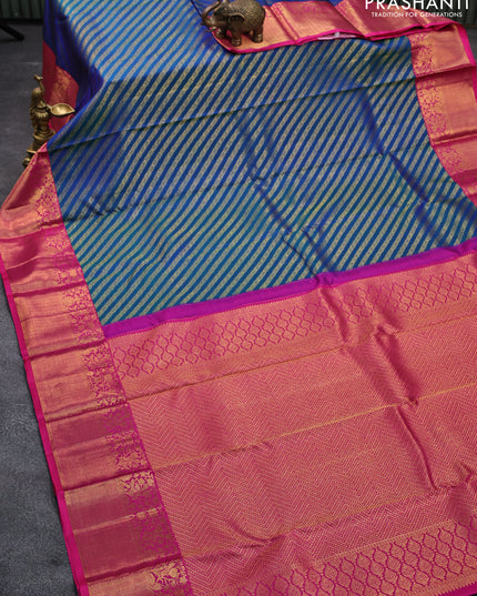 Pure kanjivaram silk saree dual shade of bluish green and pink with allover zari weaves and rich floral zari woven border
