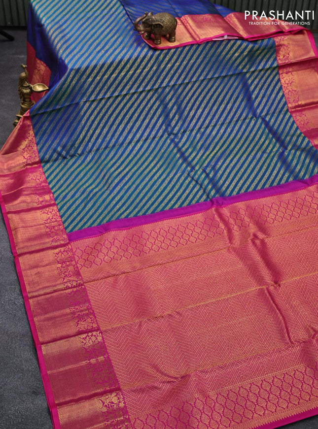 Pure kanjivaram silk saree dual shade of bluish green and pink with allover zari weaves and rich floral zari woven border