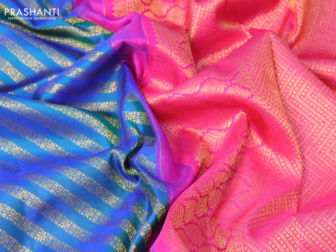 Pure kanjivaram silk saree dual shade of bluish green and pink with allover zari weaves and rich floral zari woven border