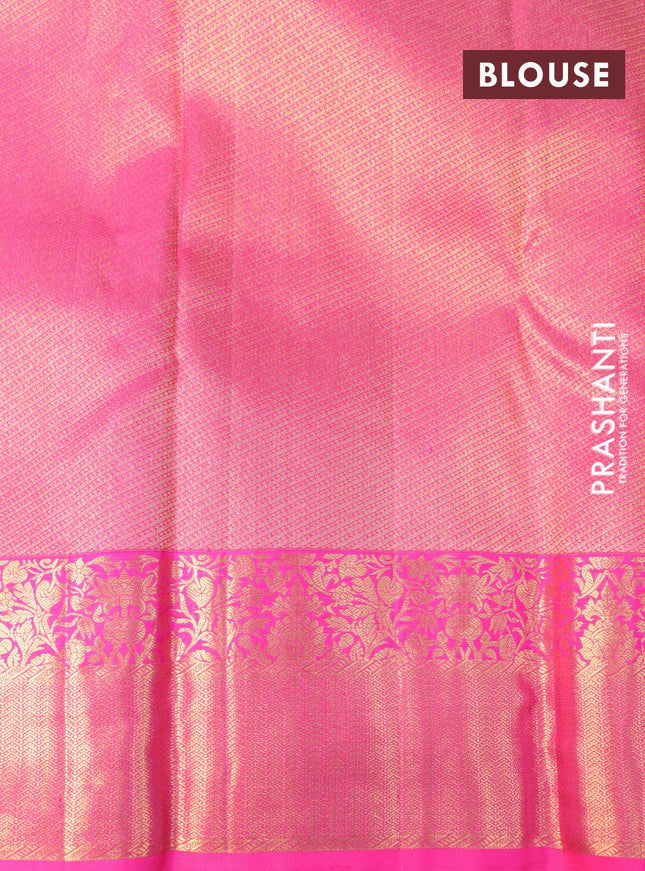 Pure kanjivaram silk saree dual shade of bluish green and pink with allover zari weaves and rich floral zari woven border