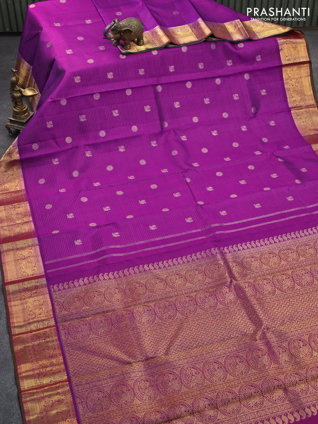 Pure kanjivaram silk saree dual shade of purple and dual shade of green with allover zari stripes & buttas and rich annam zari woven border