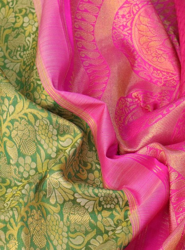 Pure kanjivaram silk saree green and pink with allover zari woven brocade weaves and long zari woven annam border