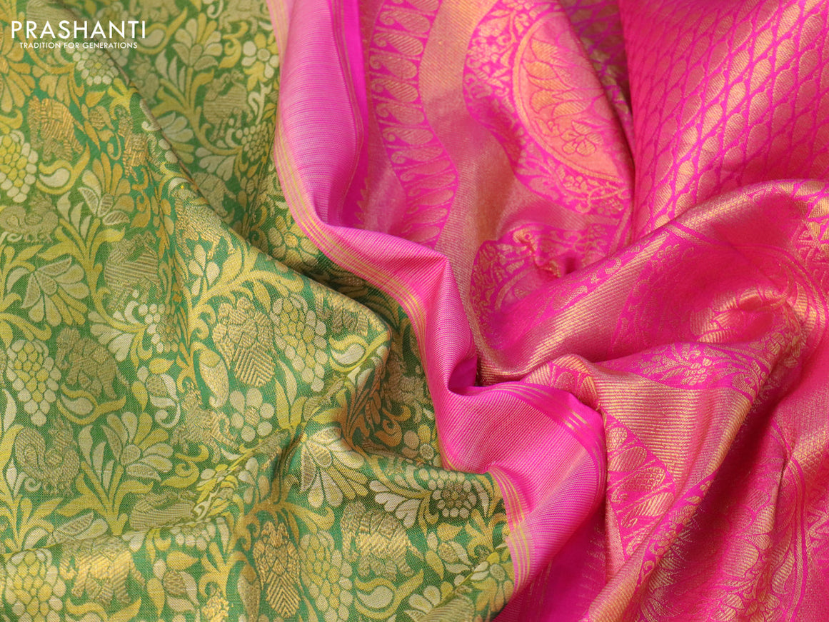 Pure kanjivaram silk saree green and pink with allover zari woven brocade weaves and long zari woven annam border