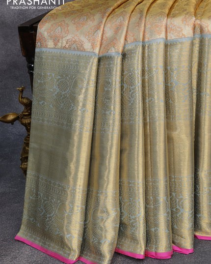 Pure kanjivaram tissue silk saree sandal and grey with allover zari woven butta weaves and long rich peacock zari woven border