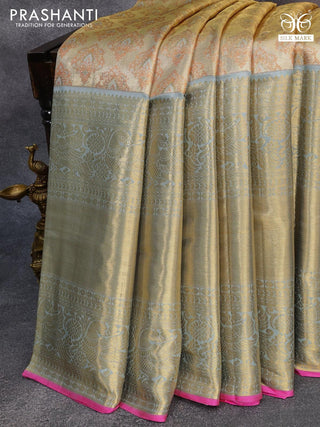 Pure kanjivaram tissue silk saree sandal and grey with allover zari woven butta weaves and long rich peacock zari woven border