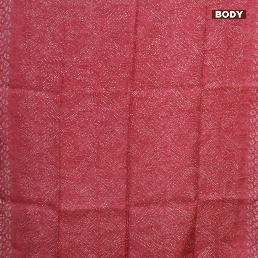 Semi linen saree red shade and dark sandal with allover bandhani prints and kalamkari printed pallu