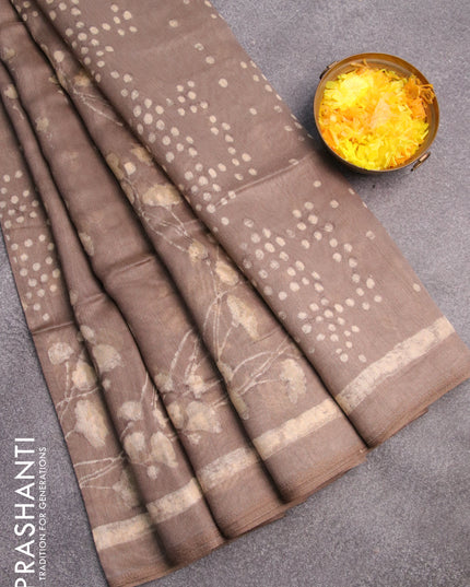 Semi linen saree grey shade with allover prints and simple border
