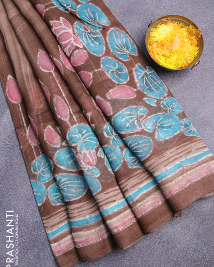 Semi linen saree brown shade  with allover prints in borderless style
