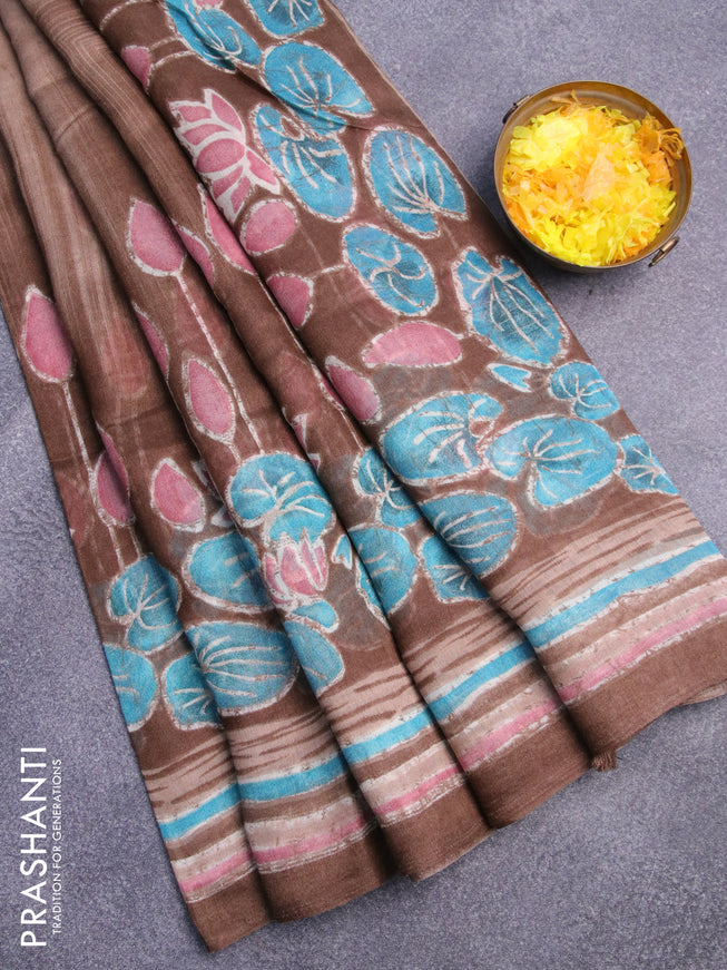 Semi linen saree brown shade  with allover prints in borderless style