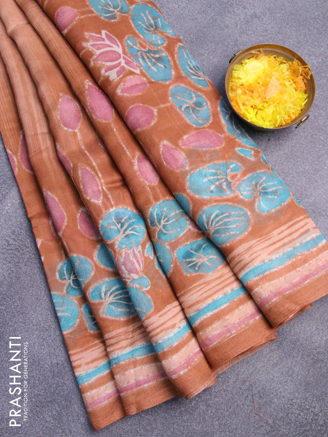 Semi linen saree peach shade with allover prints in borderless style