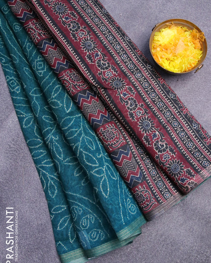 Semi linen saree teal green and black with allover bandhani prints and ajrakh printed pallu