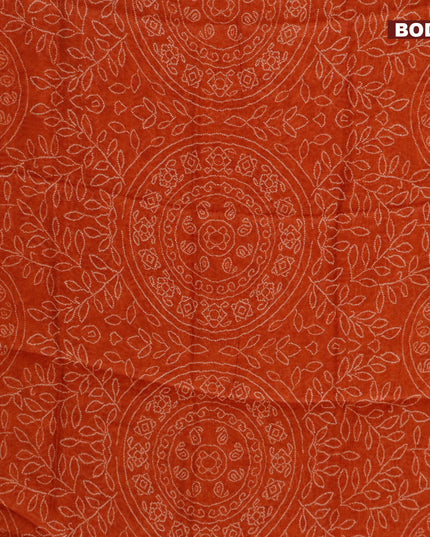 Semi linen saree rustic orange and black with allover bandhani prints and ajrakh printed pallu