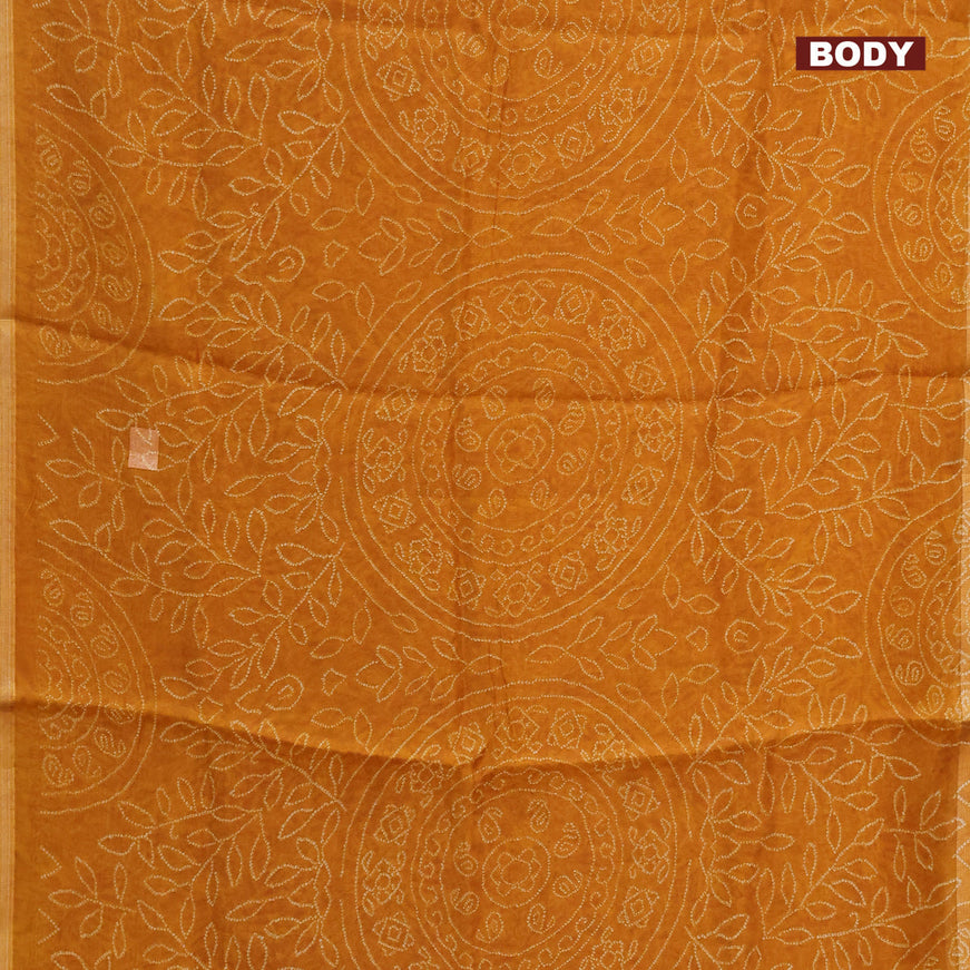 Semi linen saree mustard yellow and black with allover bandhani prints and ajrakh printed pallu