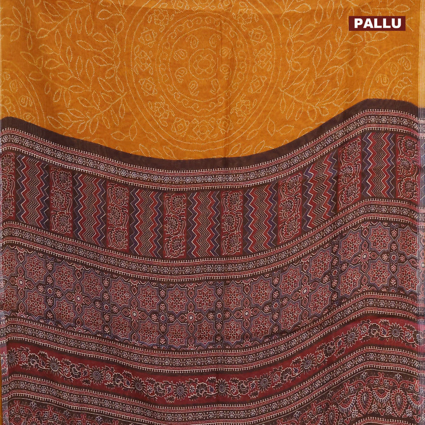 Semi linen saree mustard yellow and black with allover bandhani prints and ajrakh printed pallu