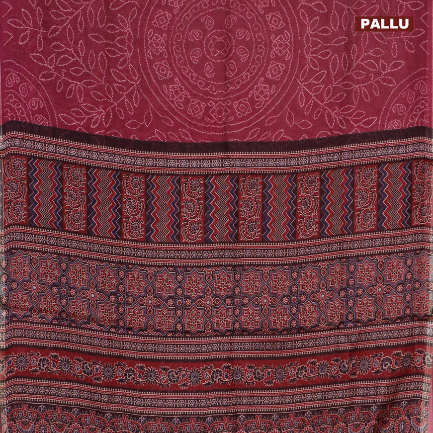 Semi linen saree dark magenta pink and black with allover bandhani prints and ajrakh printed pallu
