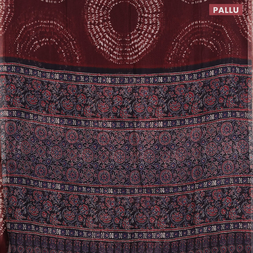 Semi linen saree deep maroon and black with allover shibori prints and ajrakh printed pallu