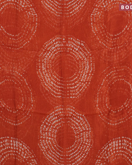 Semi linen saree rustic orange and black with allover shibori prints and ajrakh printed pallu