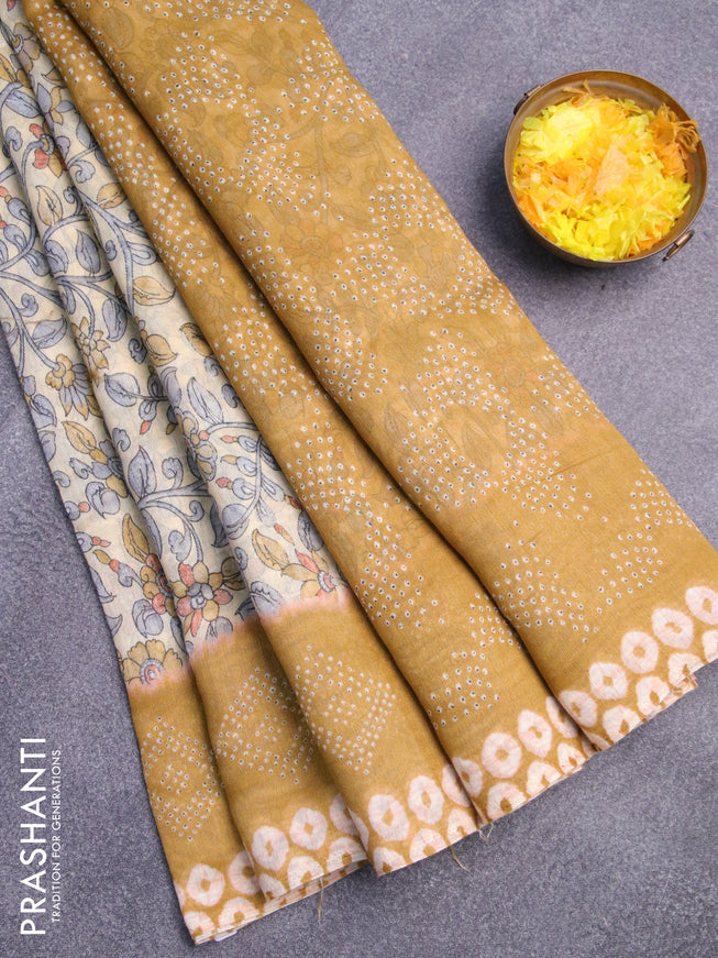 Semi linen saree pale yellow and mustard yellow with allover kalamkari prints and bandhani printed pallu