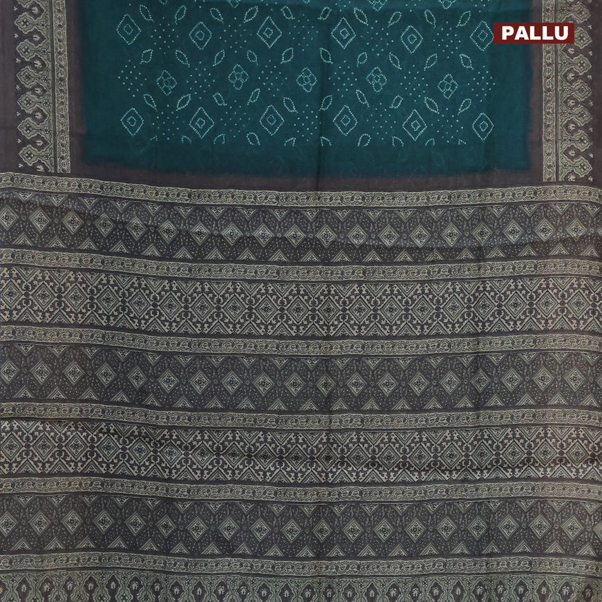Semi linen saree green and grey shade with allover bandhani prints and ajrakh printed pallu