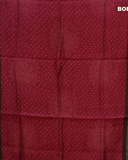Semi linen saree magenta pink and peacock green with allover bandhani prints and ajrakh printed border