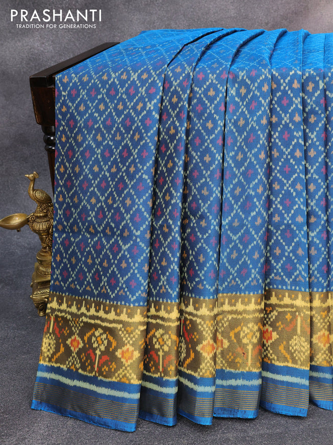 Rajkot patola silk saree peacock blue with allover ikat weaves and zari woven ikat style border