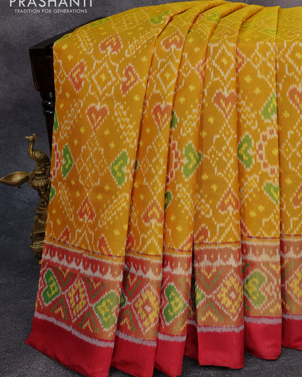 Rajkot patola silk saree mustard yellow and maroon with allover ikat weaves and zari woven ikat style border