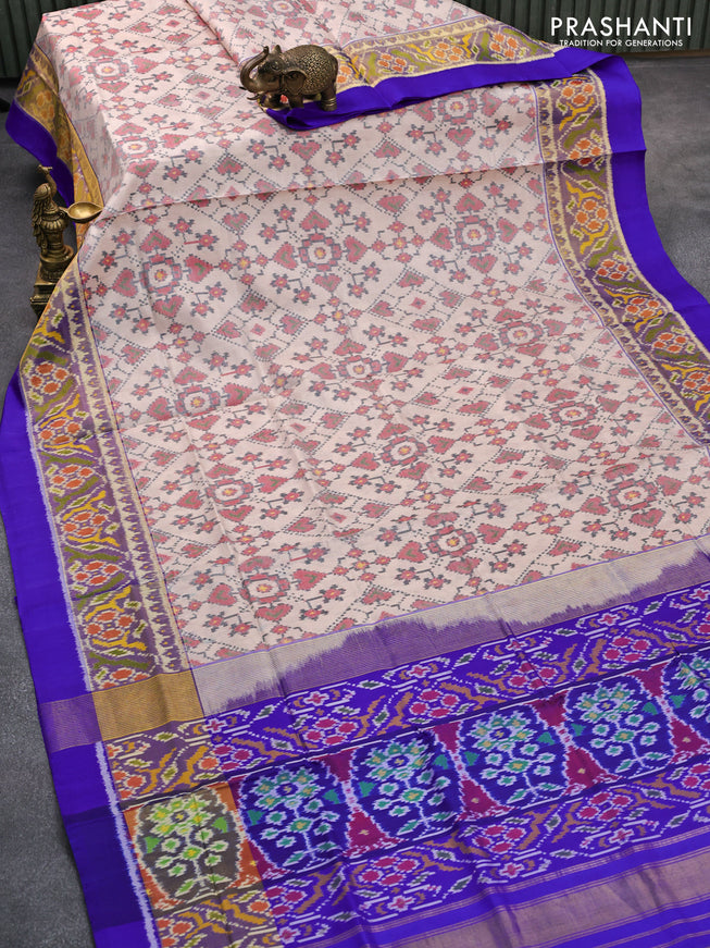 Rajkot patola silk saree cream and royal blue with allover ikat weaves and long ikat woven zari border