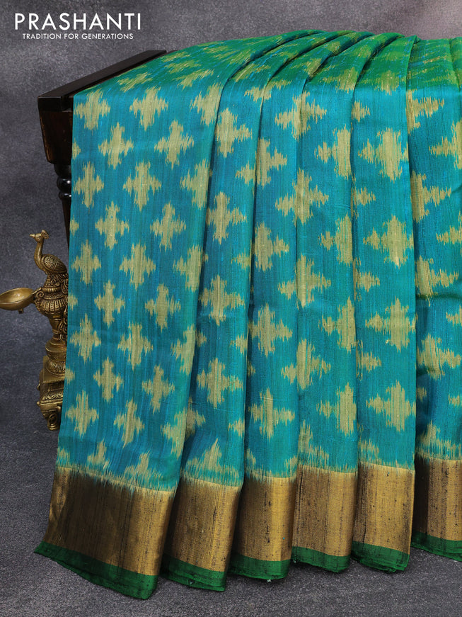 Rajkot patola silk saree dual shade of greenish blue and bottle green with allover ikat weaves & jute finish and zari woven border