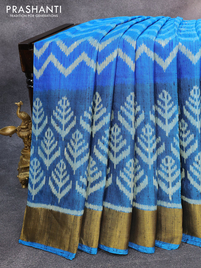 Rajkot patola silk saree cs blue and blue with allover zig zag ikat weaves & jute finish and zari woven border
