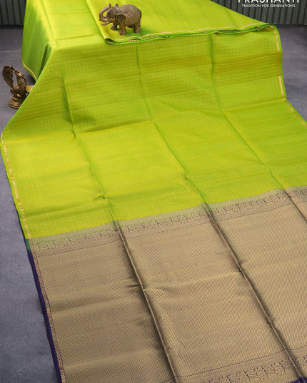 Pure soft silk saree light green and navy blue with allover zari checked pattern and small zari woven border