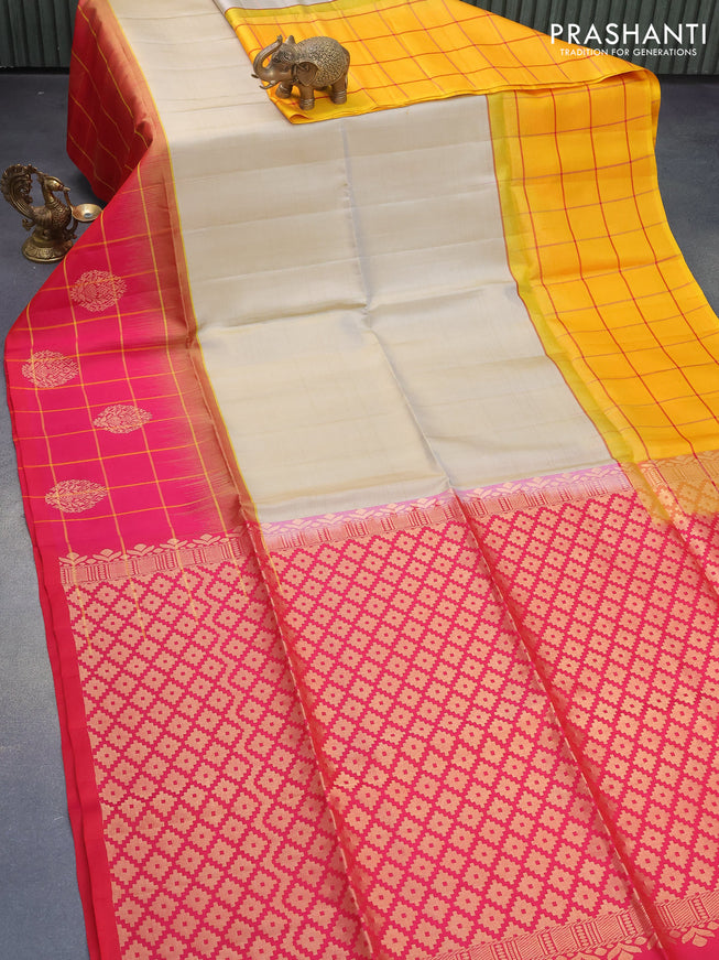 Pure soft silk saree elaichi green and reddish pink with plain body and checked pattern zari butta border