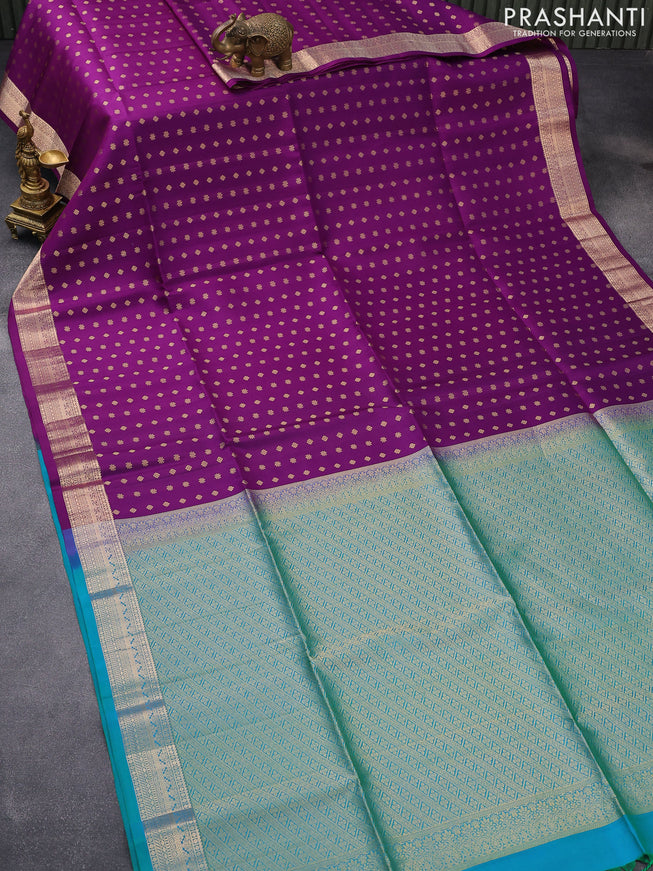 Pure soft silk saree violet and dual shade of teal blue with allover zari woven butta weaves and zari woven border
