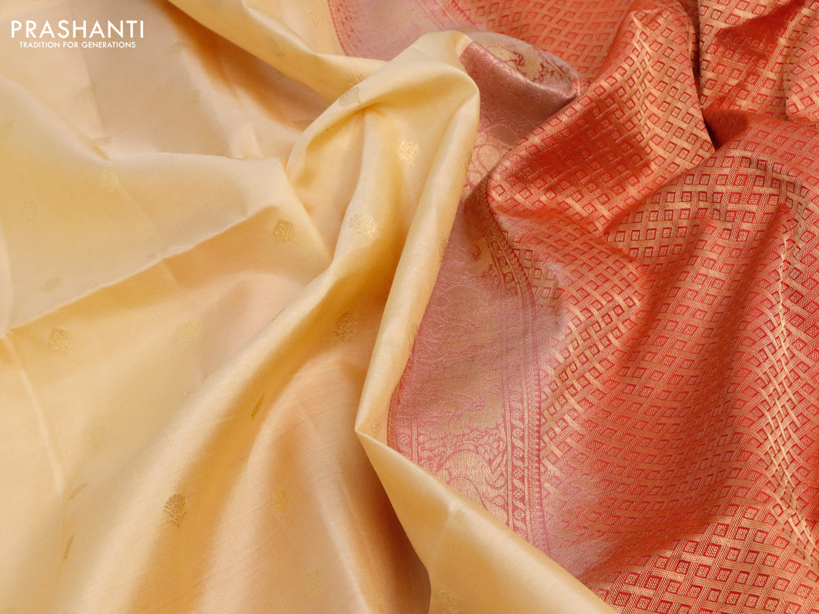 Pure soft silk saree sandal and dual shade of pinkish orange with allover zari woven butta weaves and rettapet zari woven border