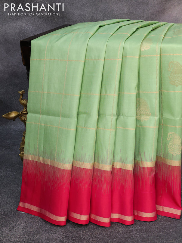 Pure soft silk saree pastel green and pink with allover zari checks & buttas and rettapet zari woven border