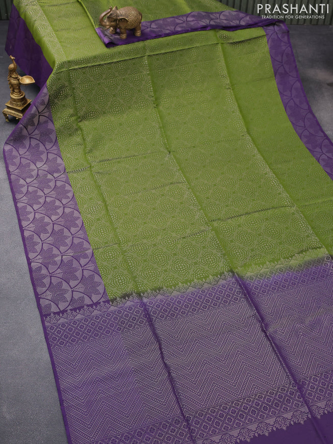 Pure soft silk saree green and deep violet with allover silver zari woven brocade weaves and silver zari woven border