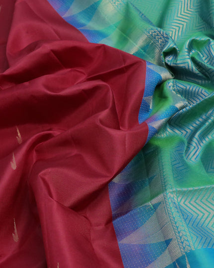 Pure soft silk saree maroon and dual shade of teal blue with zari woven muniya buttas and temple design zari woven border