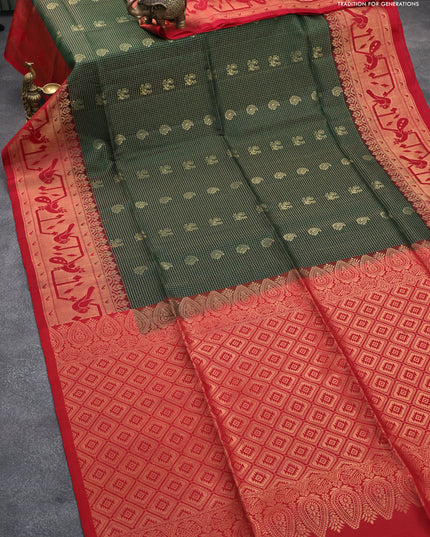 Pure soft silk saree bottle green and red with allover small zari checks & buttas and long zari woven border