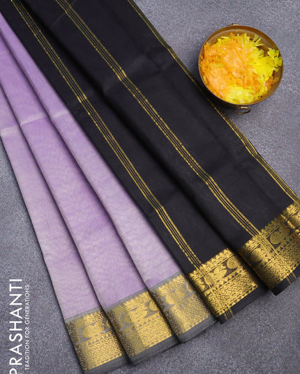 Silk cotton saree dual shade of greyish lavender and black with plain body and zari woven border