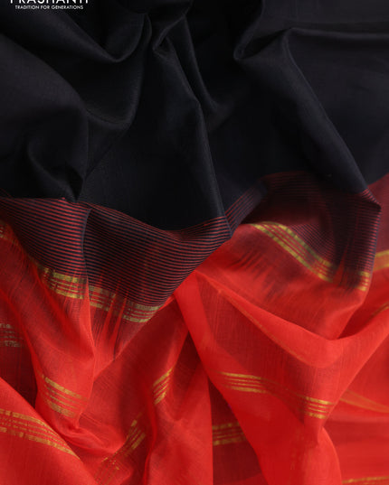 Silk cotton saree black and orange with plain body and zari woven border