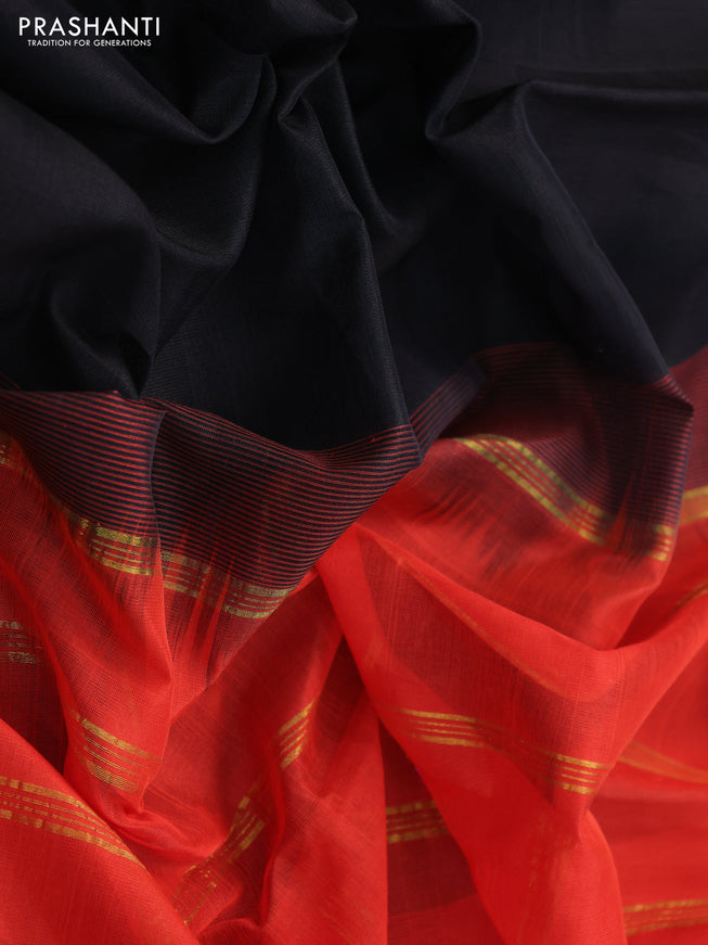 Silk cotton saree black and orange with plain body and zari woven border