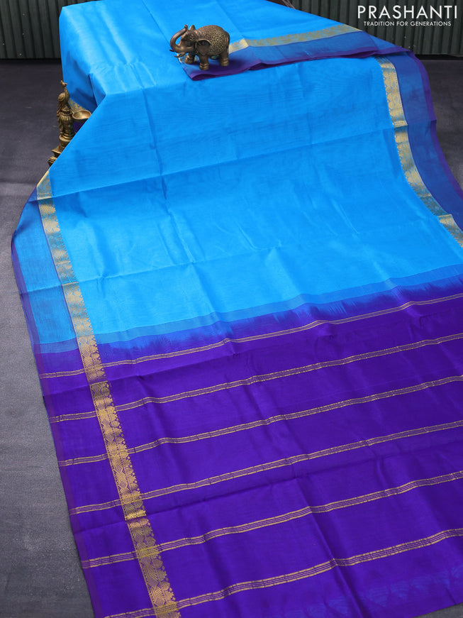 Silk cotton saree light blue and blue with plain body and zari woven simple border